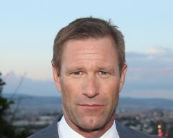 WHAT IS THE ZODIAC SIGN OF AARON ECKHART?
